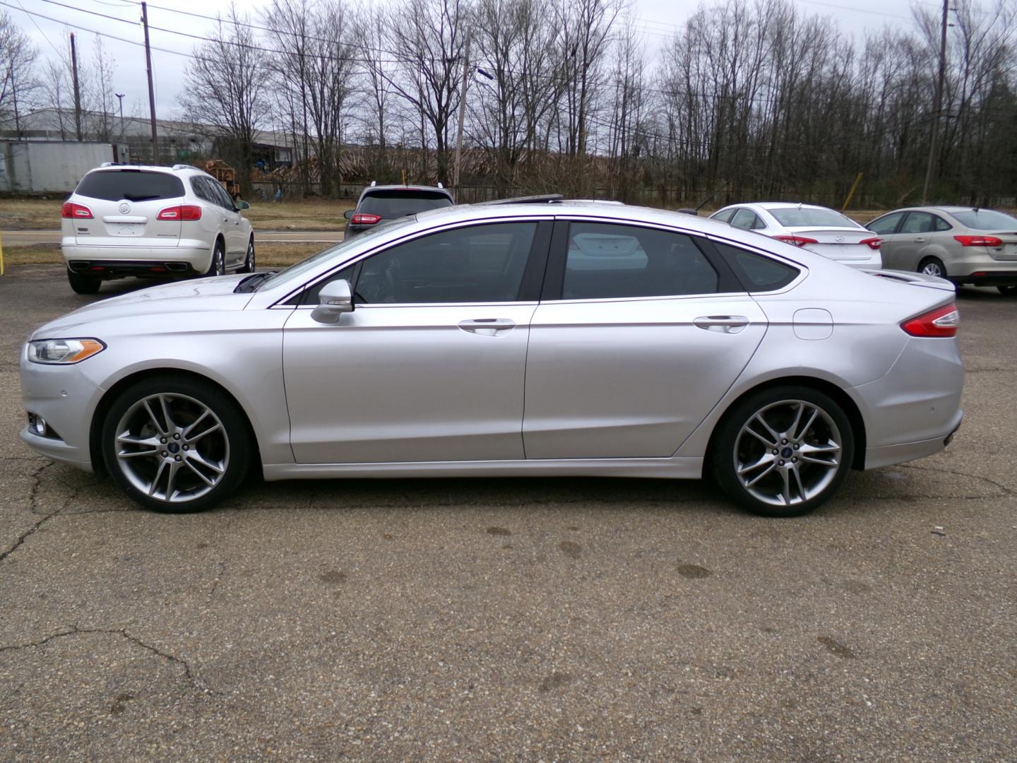 2013 Silver /Black Ford Fusion Titanium (3FA6P0K97DR) with an 2.0L L4 DOHC 16V engine, automatic transmission, located at 401 First NE, Bearden, AR, 71720, (870) 687-3414, 33.726528, -92.611519 - Photo#1